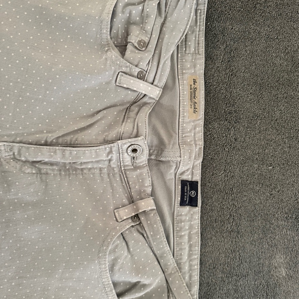 AG grey and white polka dots on them